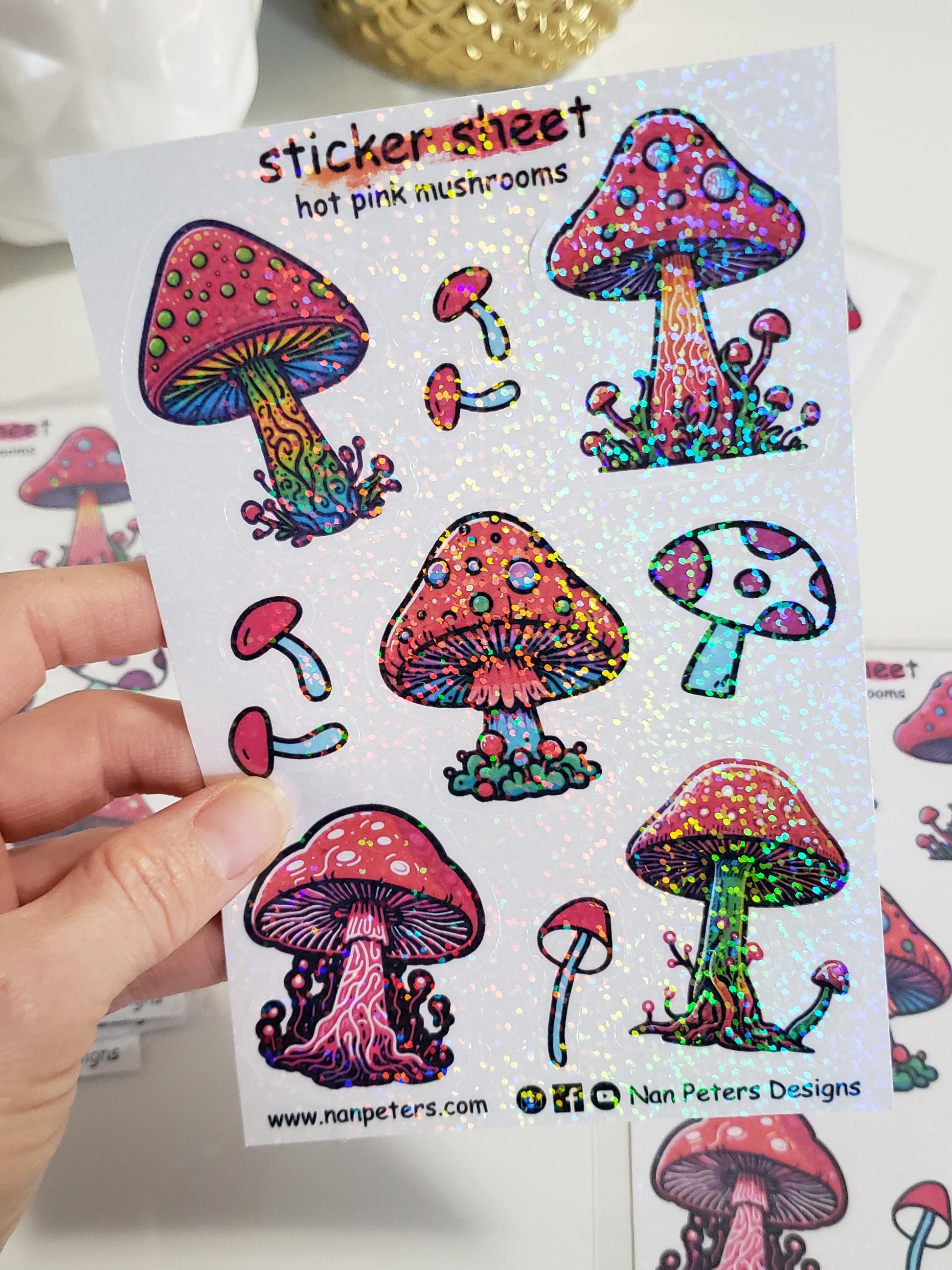 Hot pink glitter mushroom sticker sheet set. 5 bright and colourful mushroom stickers, with a lot of details on the mushrooms. 4 small simple little mushroom stickers to surround the bigger stickers. These are B grade stickers that were not cut with the same depth during the machine cutting process. Will require patients when removing stickers from the sticker backer paper. Still very beautiful usable stickers.