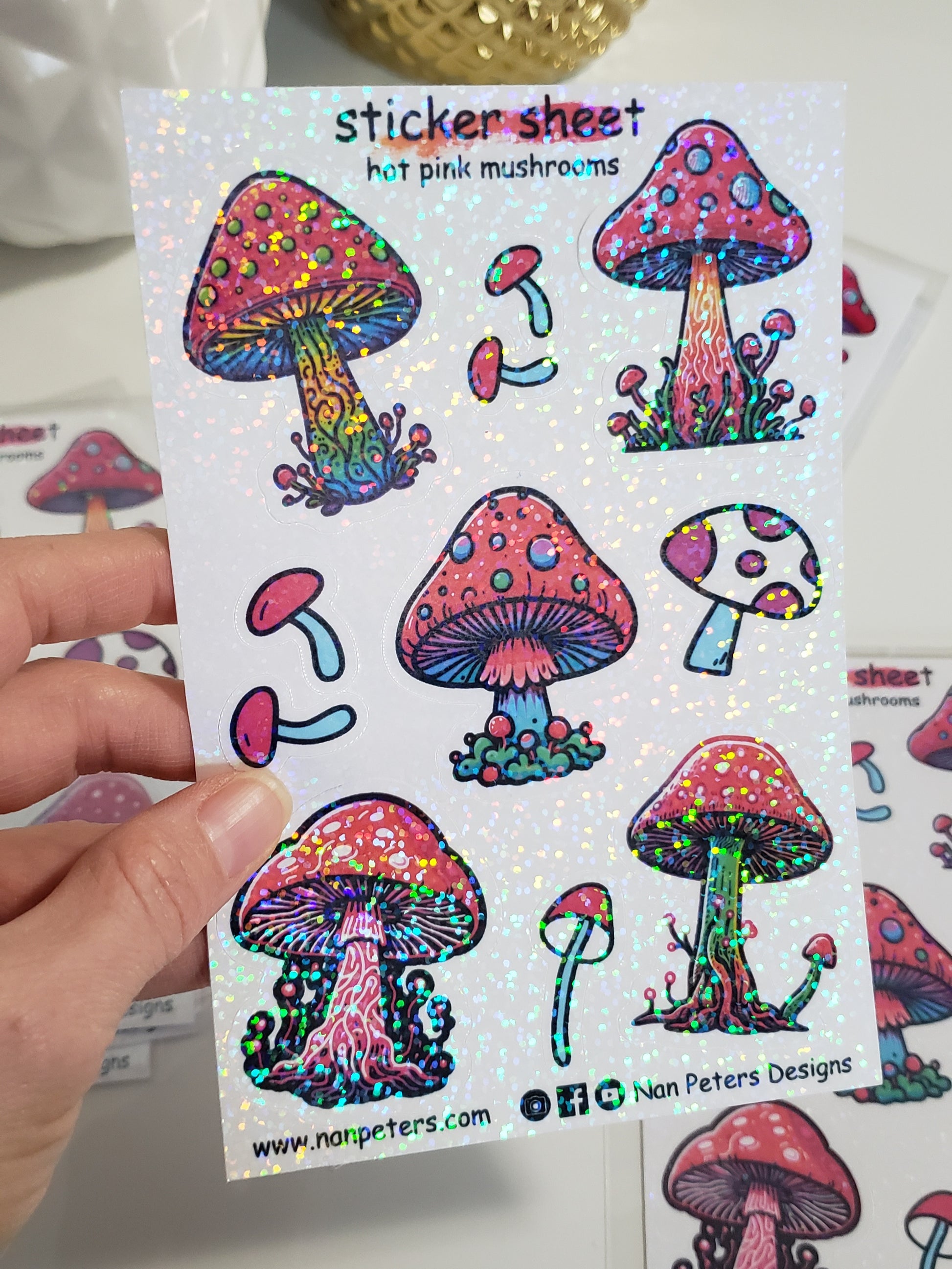 Hot pink glitter mushroom sticker sheet set. 5 bright and colourful mushroom stickers, with a lot of details on the mushrooms. 4 small simple little mushroom stickers to surround the bigger stickers. These are B grade stickers that were not cut with the same depth during the machine cutting process. Will require patients when removing stickers from the sticker backer paper. Still very beautiful usable stickers.