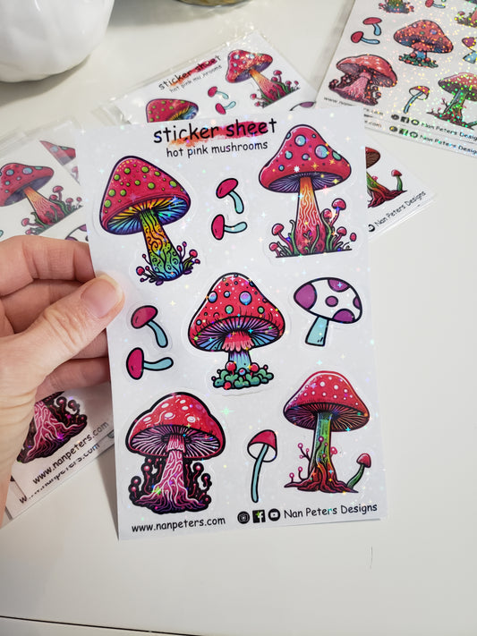 Hot pink sparkly star mushroom sticker sheet set. 5 bright and colourful mushroom stickers, with a lot of details on the mushrooms. 4 small simple little mushroom stickers to surround the bigger stickers. These are B grade stickers that were not cut with the same depth during the machine cutting process. Will require patients when removing stickers from the sticker backer paper. Still very beautiful usable stickers.